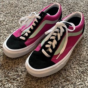 Pink and black lace up vans